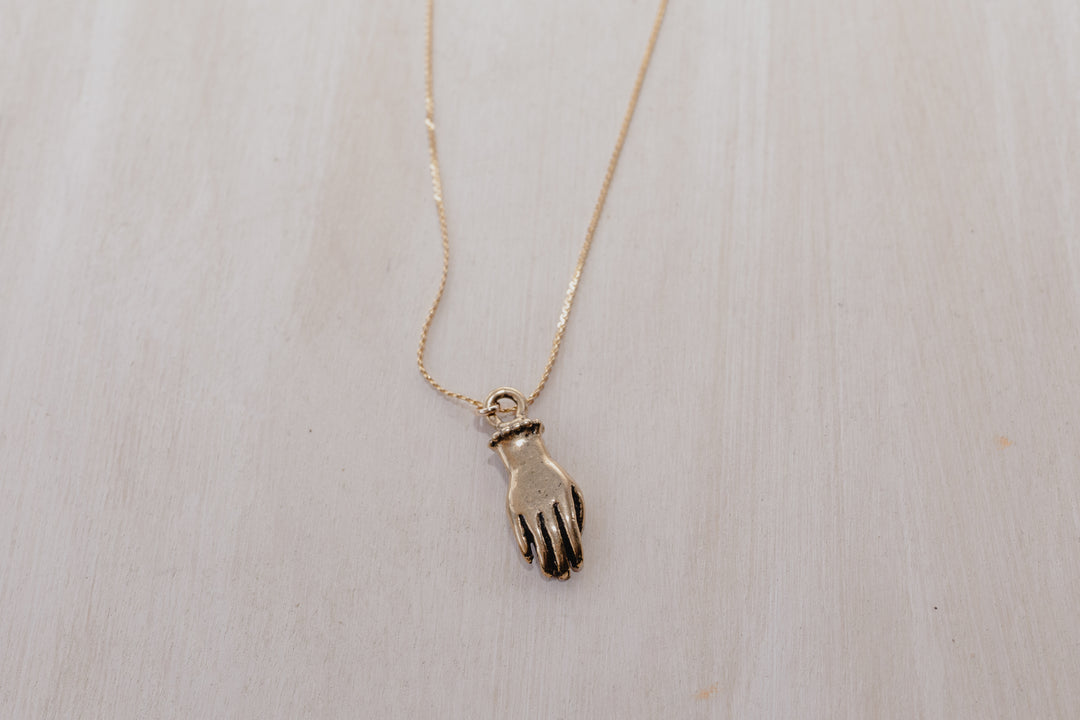 Bronze figa hand charm on gold chain