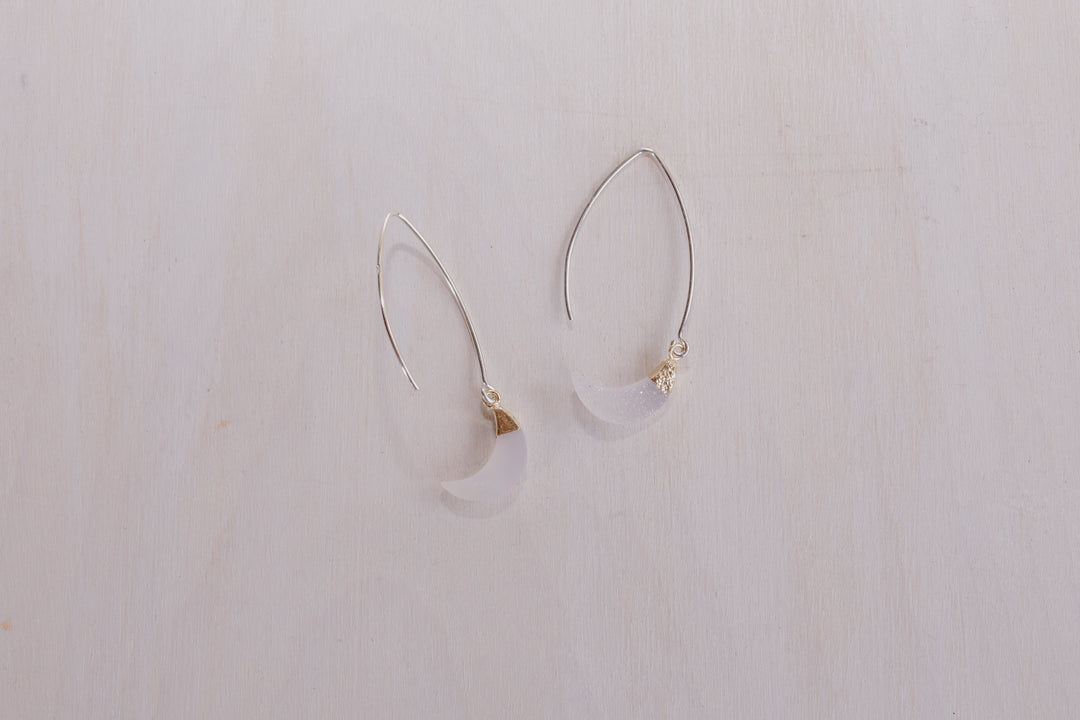 2 earrings with silver posts and crystal half moon charms