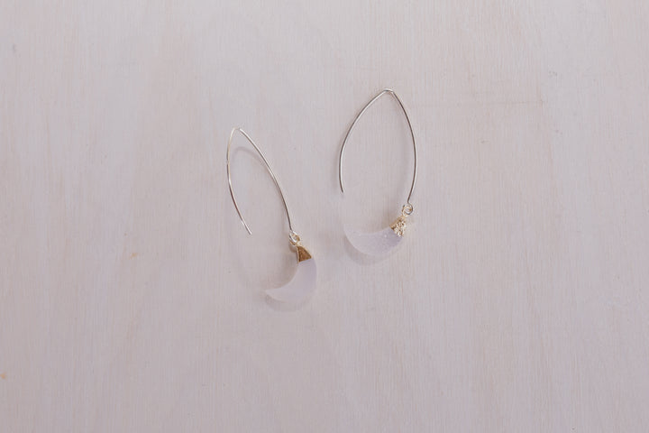 2 earrings with silver posts and crystal half moon charms
