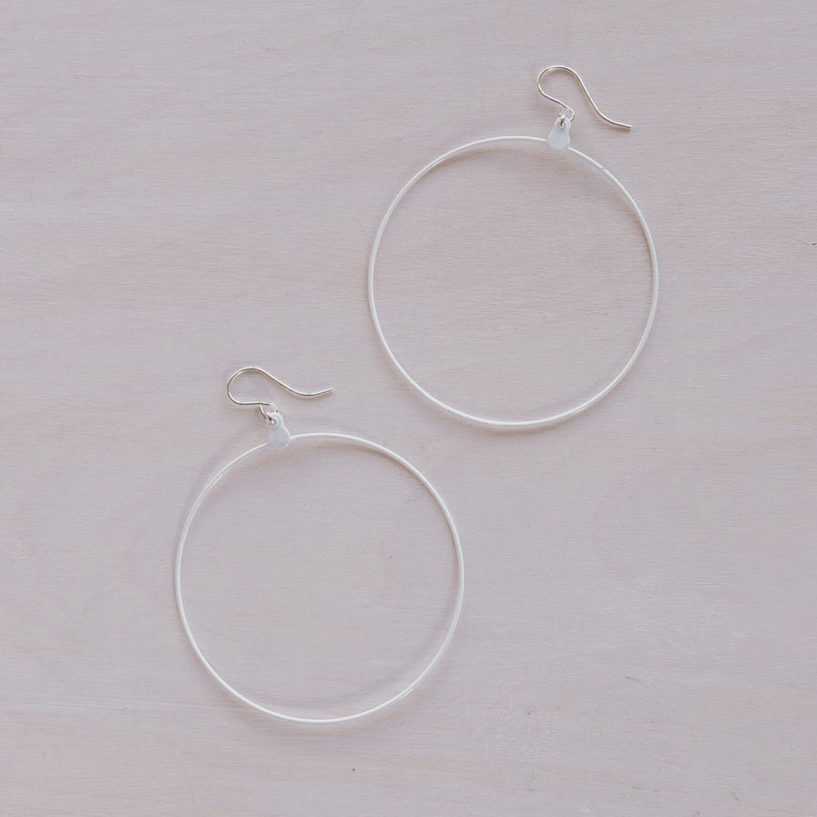 2 white hoop earrings