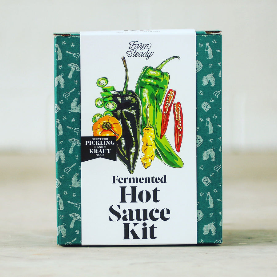 Green and white box with illustration of peppers