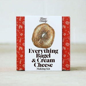 red and white box of product with illustration of bagel on it.