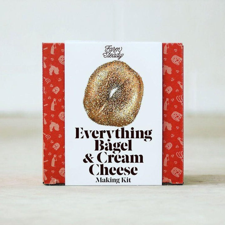 red and white box of product with illustration of bagel on it.