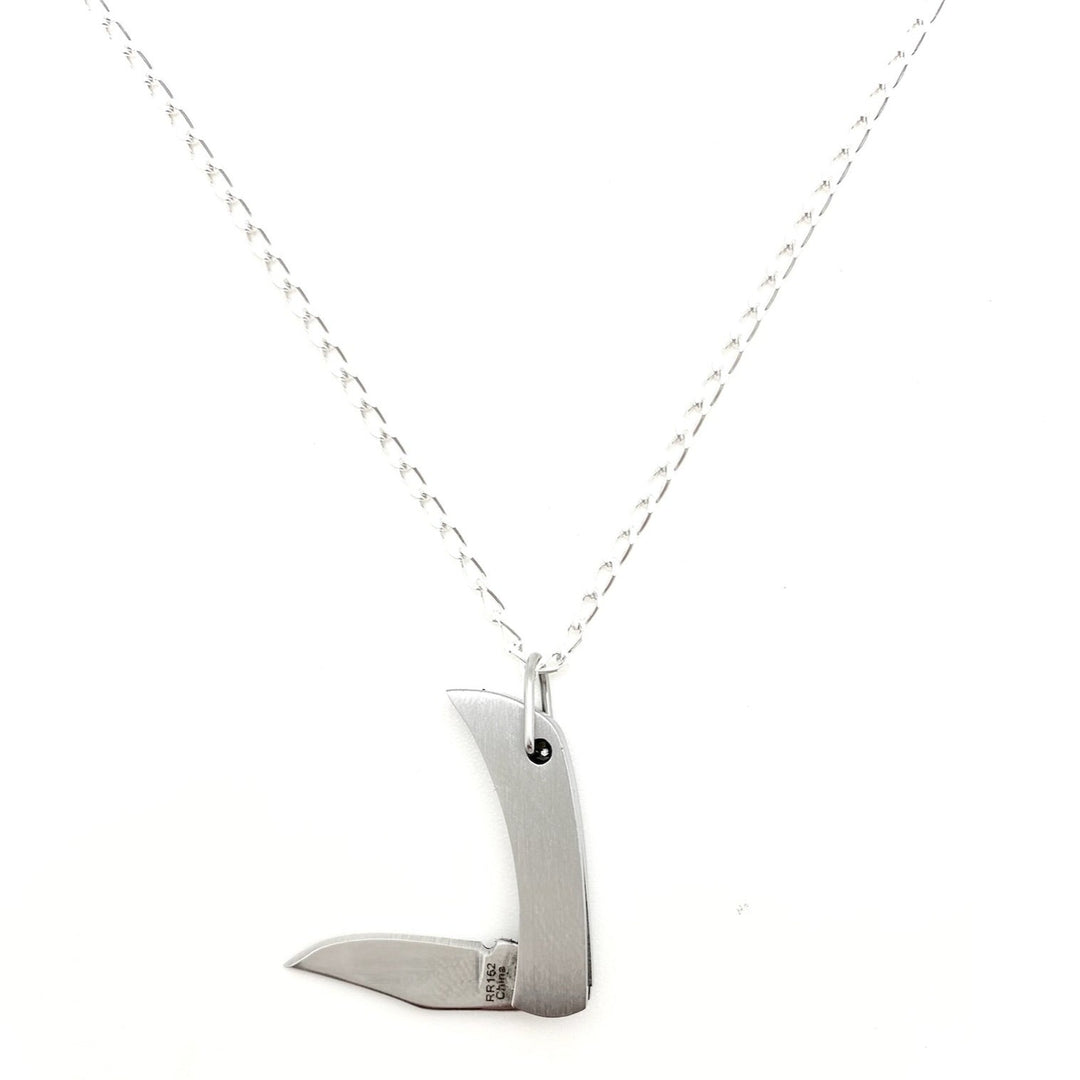 Tiny silver pocketknife on silver chain