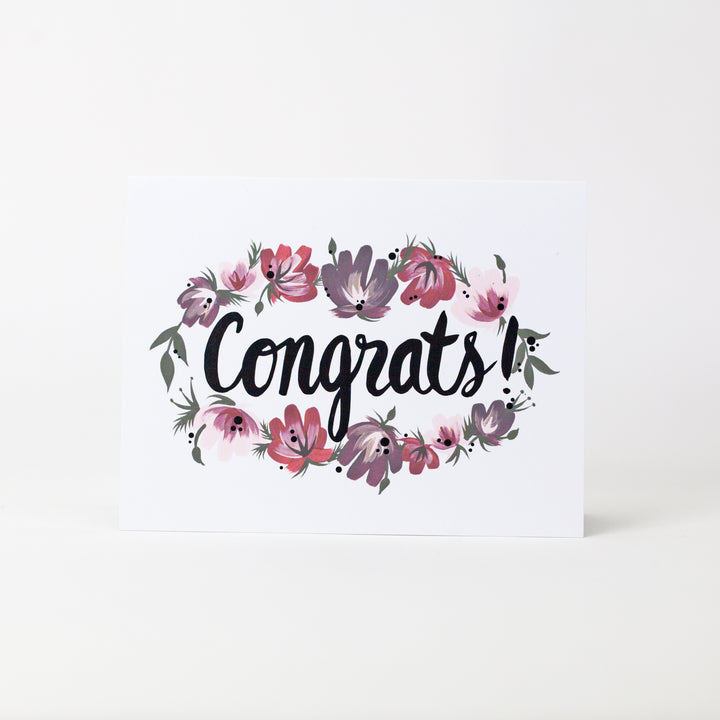 Hand-painted floral CONGRATS greeting card with black metallic accents. 
