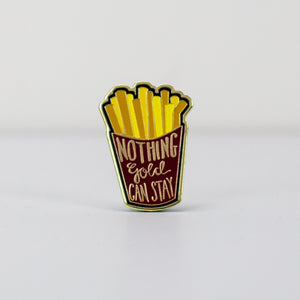 red and yellow french fry in holder pin
