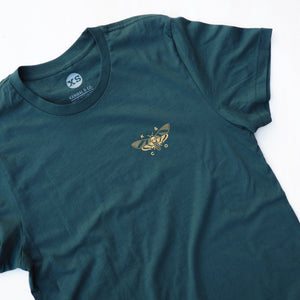 Front of a forest green tee shirt with a small moth in the upper right-hand side of chest