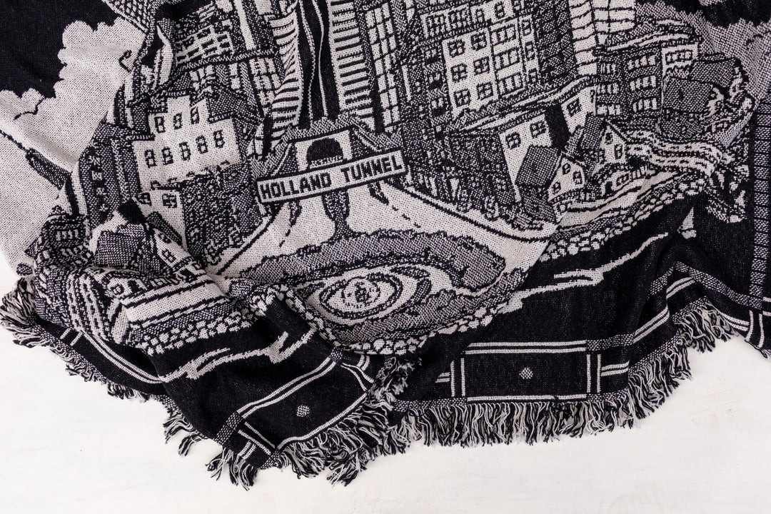 Kanibal & Co. custom Jersey City blanket featuring detailed cityscape design with Holland Tunnel depiction