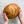 Freshly baked artisan sourdough bread held in hands made using DIY sourdough bread kit