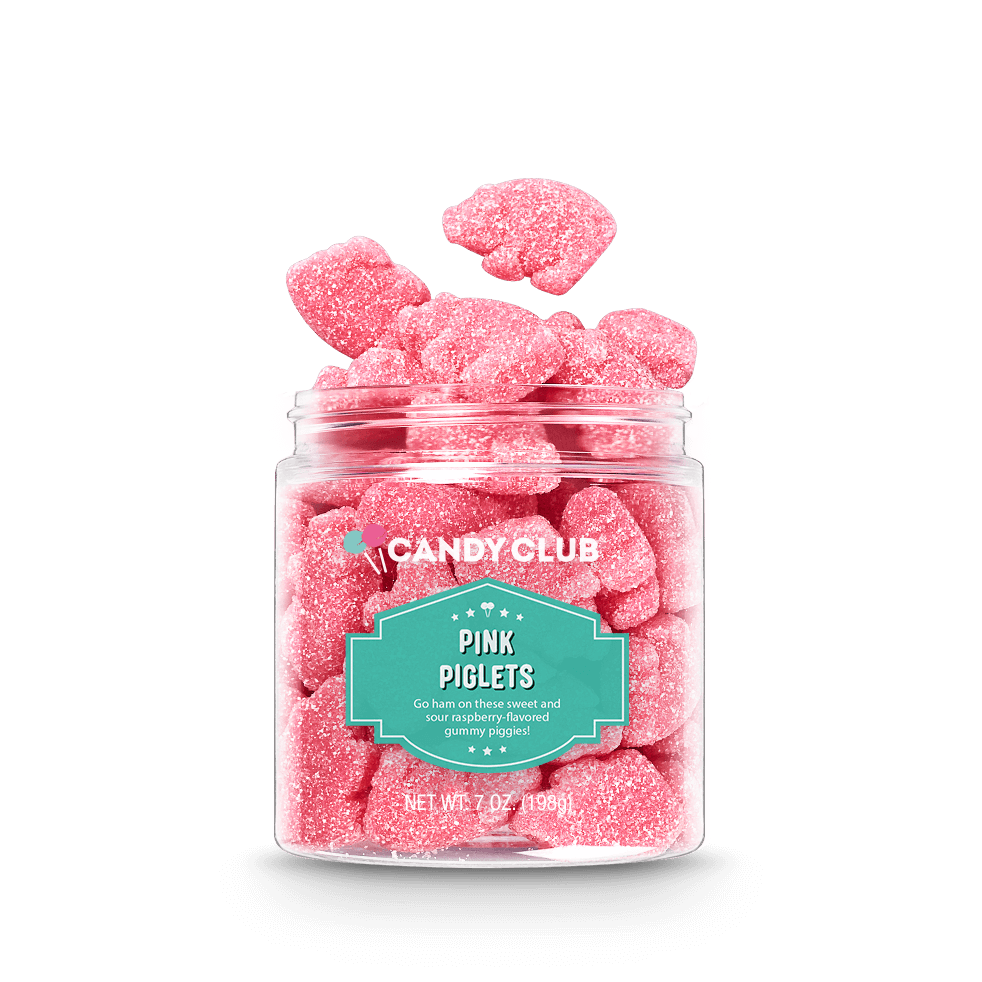 Pink piglet sour candies spilling out of jar