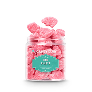 Pink piglet sour candies spilling out of jar