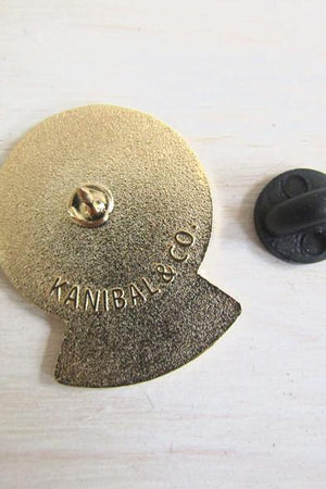 back of pin in gold with logo and clasp