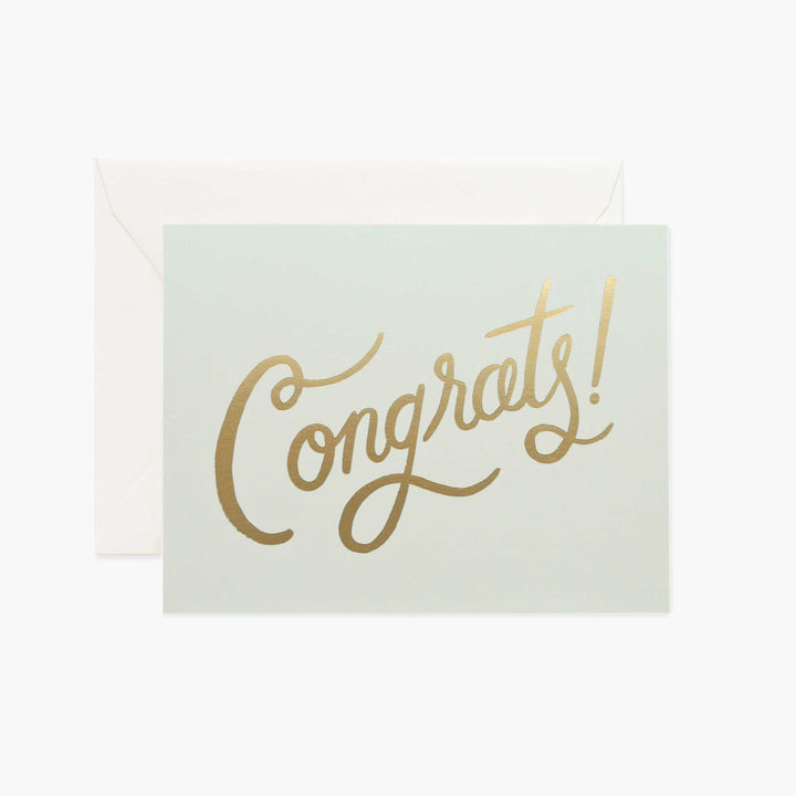 A card that simply reads "Congrats!" in gold letters.