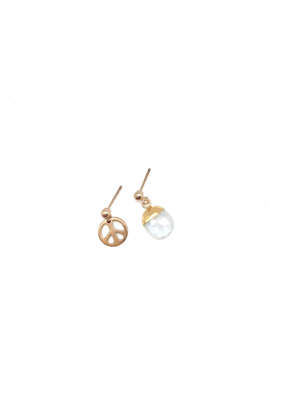 2 earrings, one peace sign charm one crystal drop