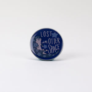 Kanibal & Co otter space enamel pin with lost in otter space text and star design